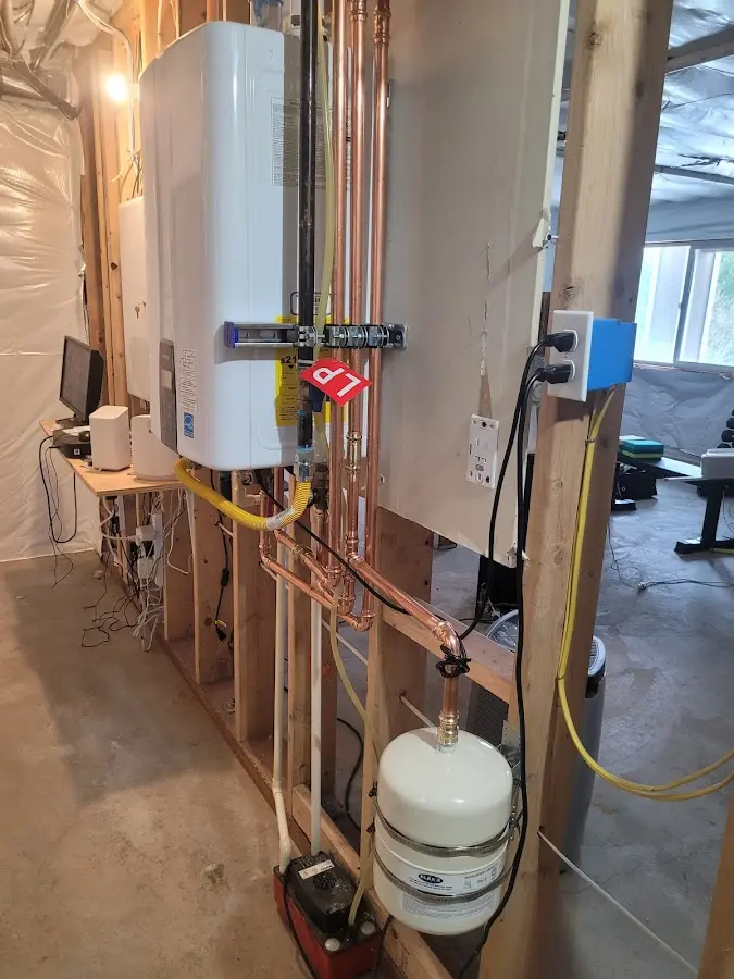 Licensed plumber repairing a kitchen sink in Springfield